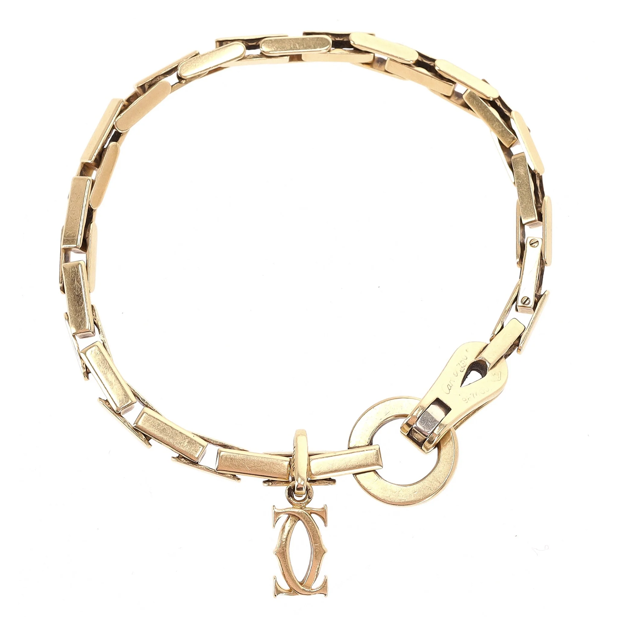 Cartier 18k Gold Agrafe Bracelet With Cartier Logo Charm